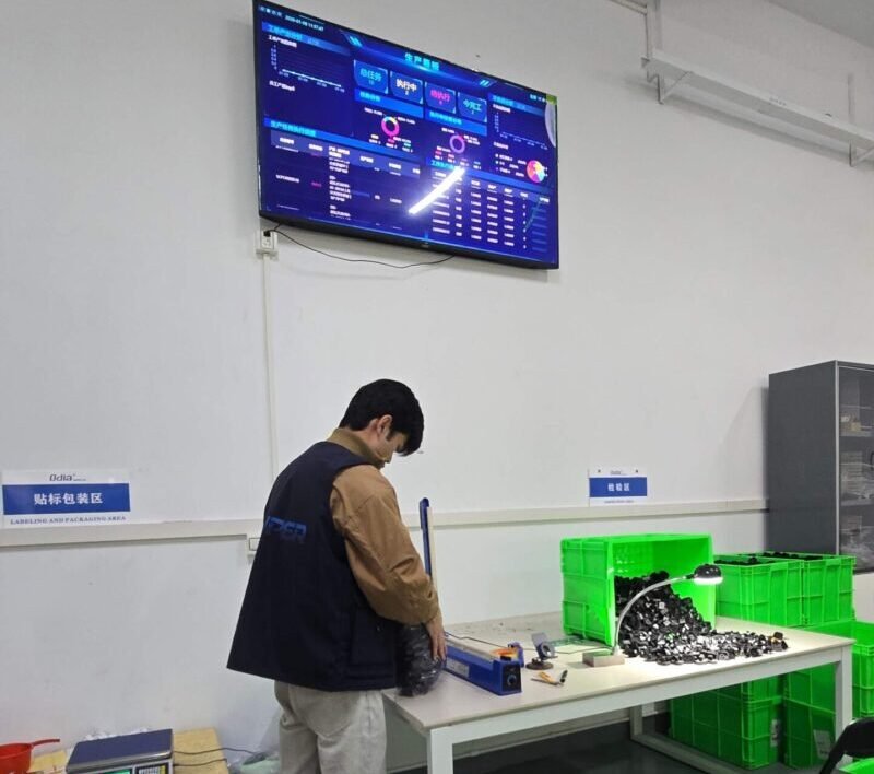 Export packaging station with custom cartons ready for global shipping